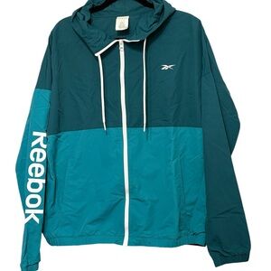 Rebook vintage windbreaker size L teal color block,design, excellent condition